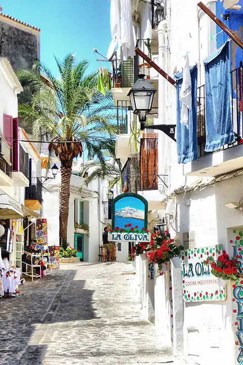 Visit Ibiza's old town with its charming shops