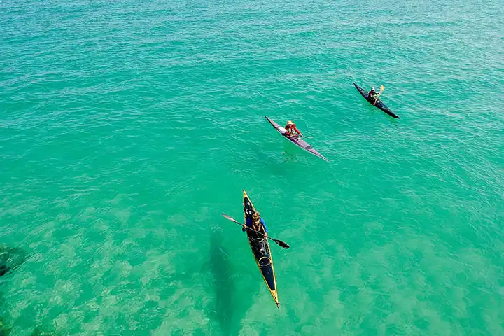 Activities in Ibiza: kayaking and exploring caves